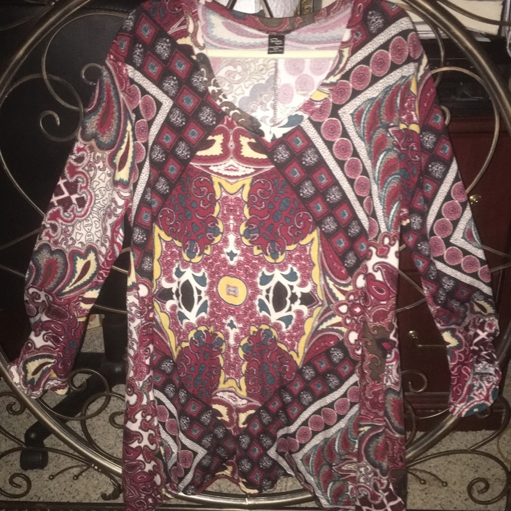 Beautiful bell sleeve tunic with flared bottom!